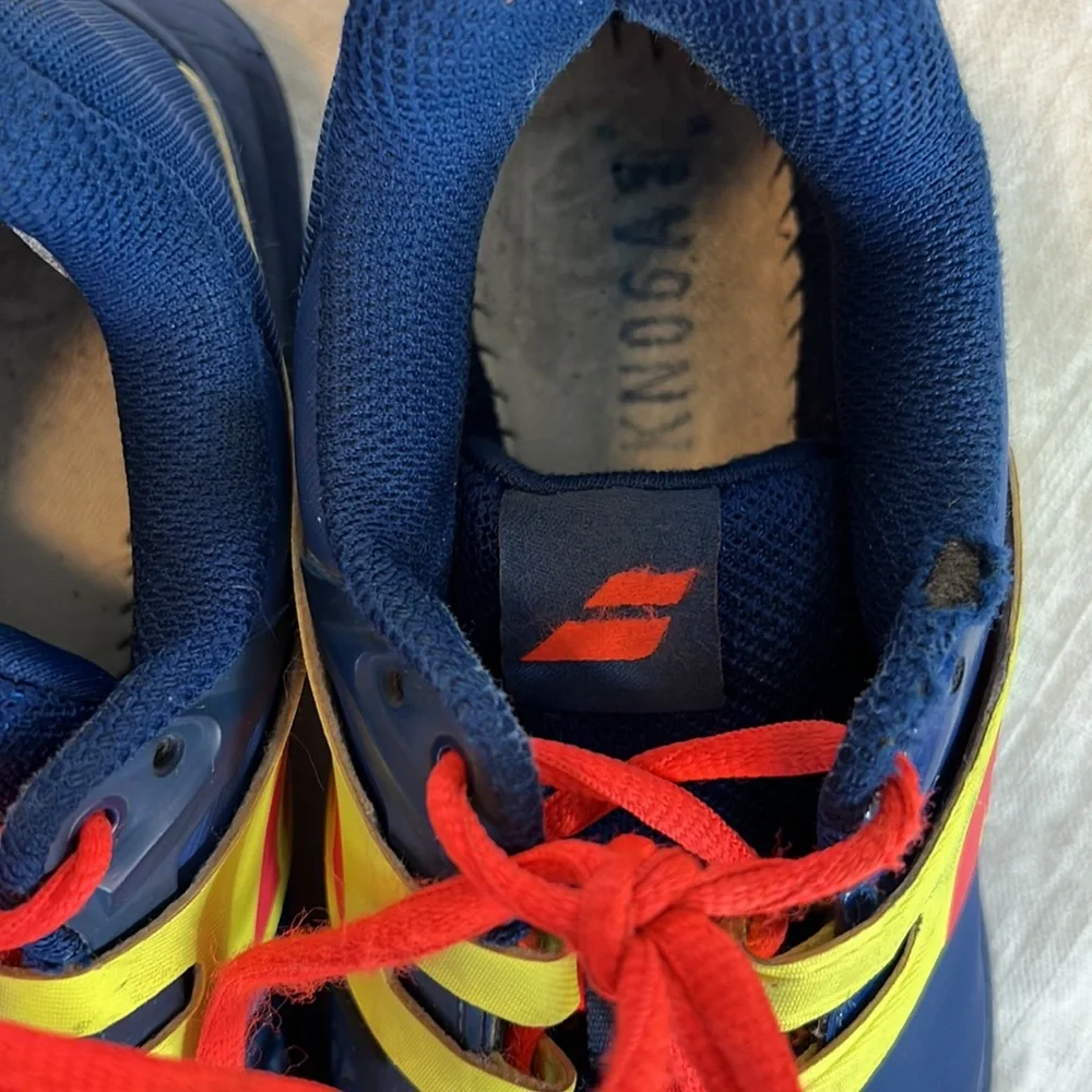 Babolat boy tennis shoes.  Size 5